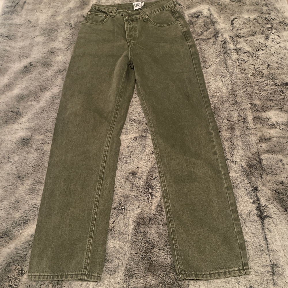 Green denim, asymmetric jeans, size 0.